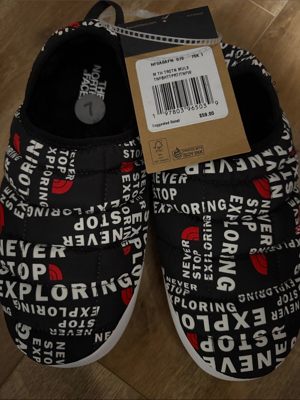 The North Face women’s Black, Red & White Slip-On Mules